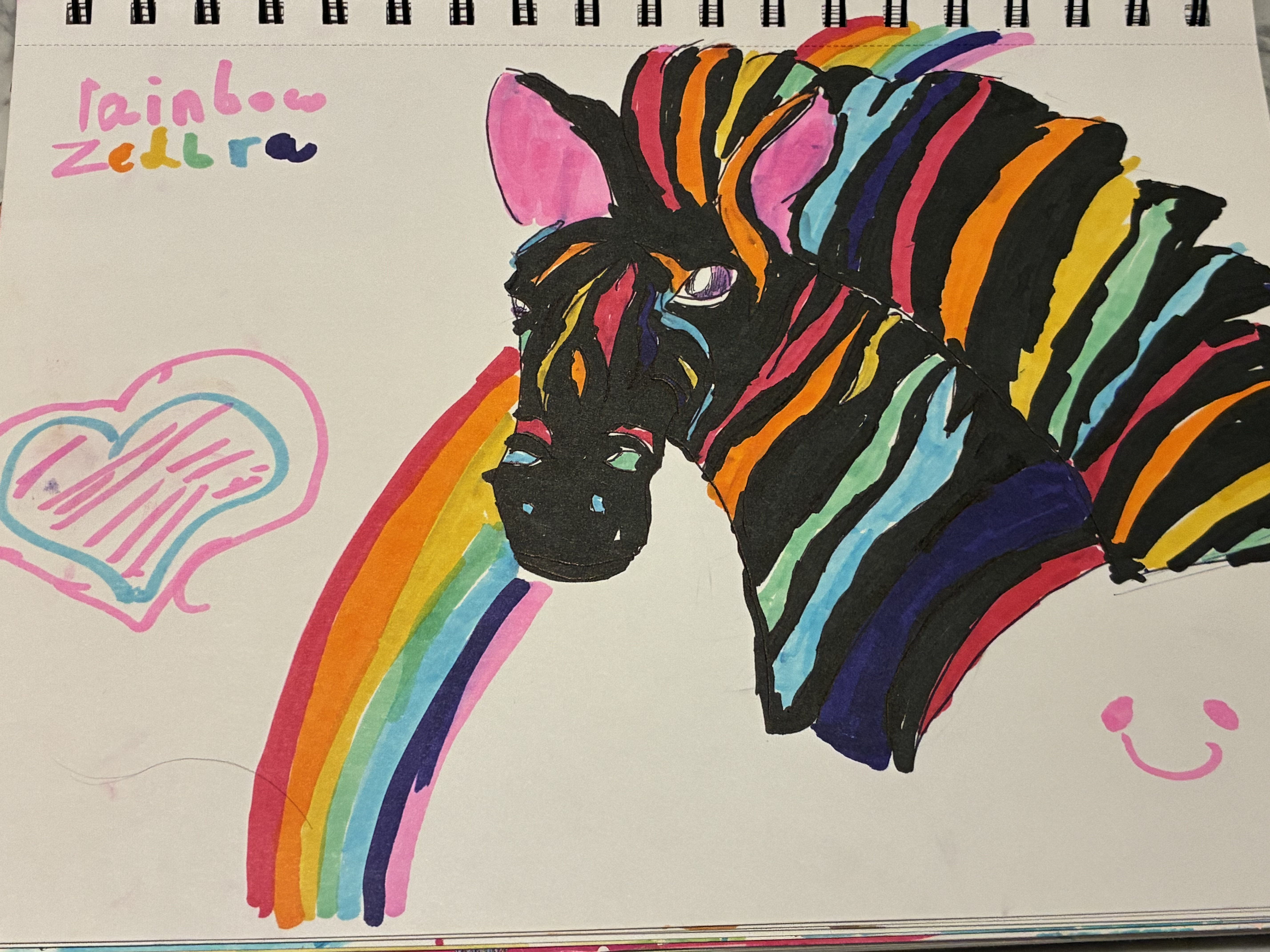 A black and rainbow, striped zebra
